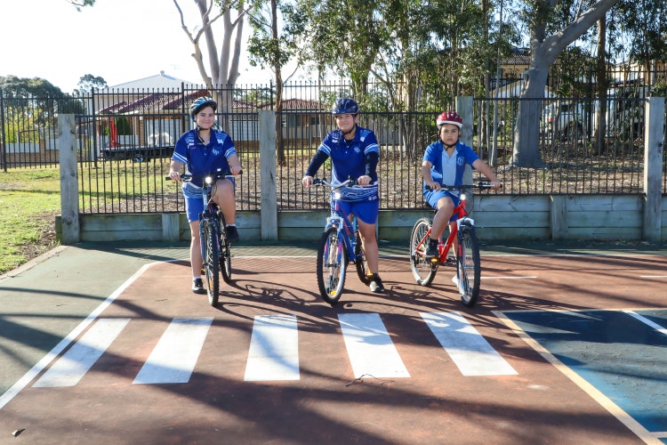 children riding bikes outside