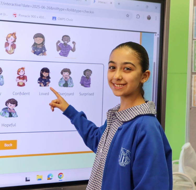 Student pointing to wellbeing check-in