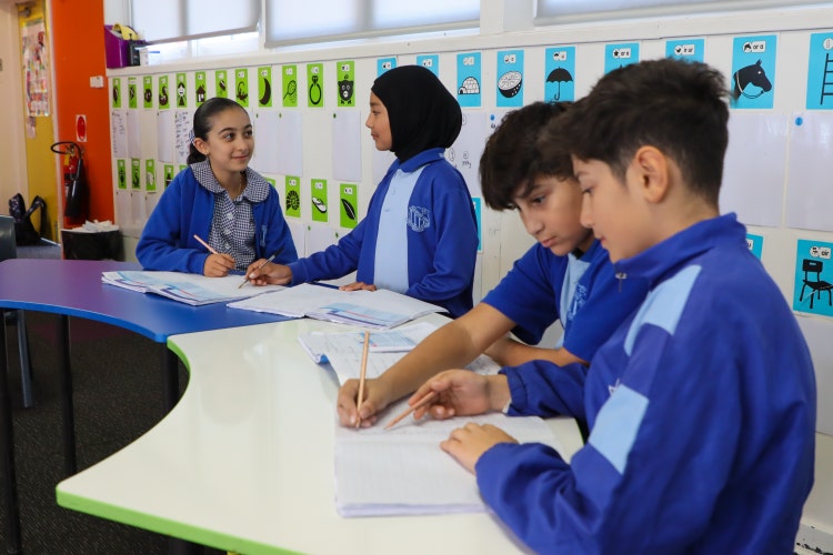 Students working together in a classroom